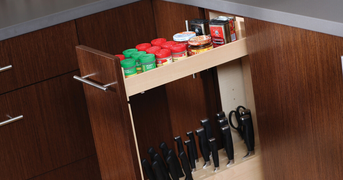 The top shelf of Dura Supreme's pull-out accessories includes a multi-purposeful tray at the top. (i.e. pantry pull-outs, knife block pull-out, tray pull-out, dish rack pull-out, and more) These shallow shelves are perfect for spices.