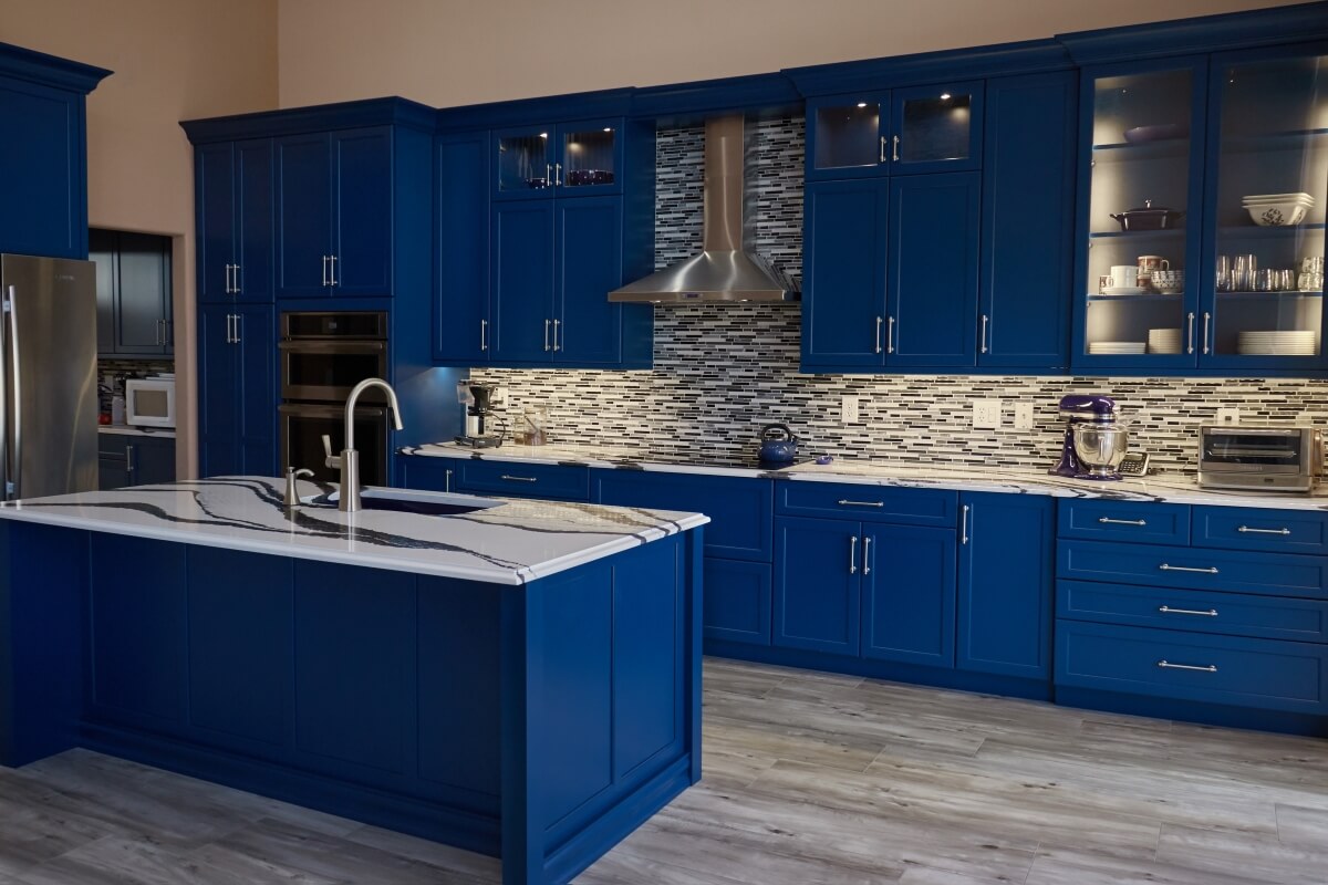 Beautiful, bold blue kitchen designed by the Design Team at Artistic Cabinetry.