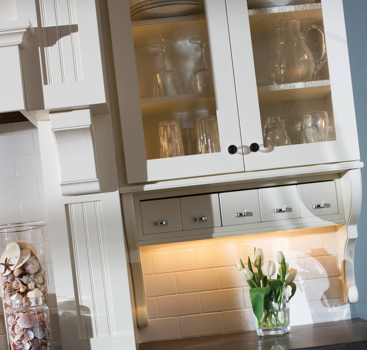 Glass cabinet doors in a cottage style kitchen design with Dura Supreme Cabinetry.
