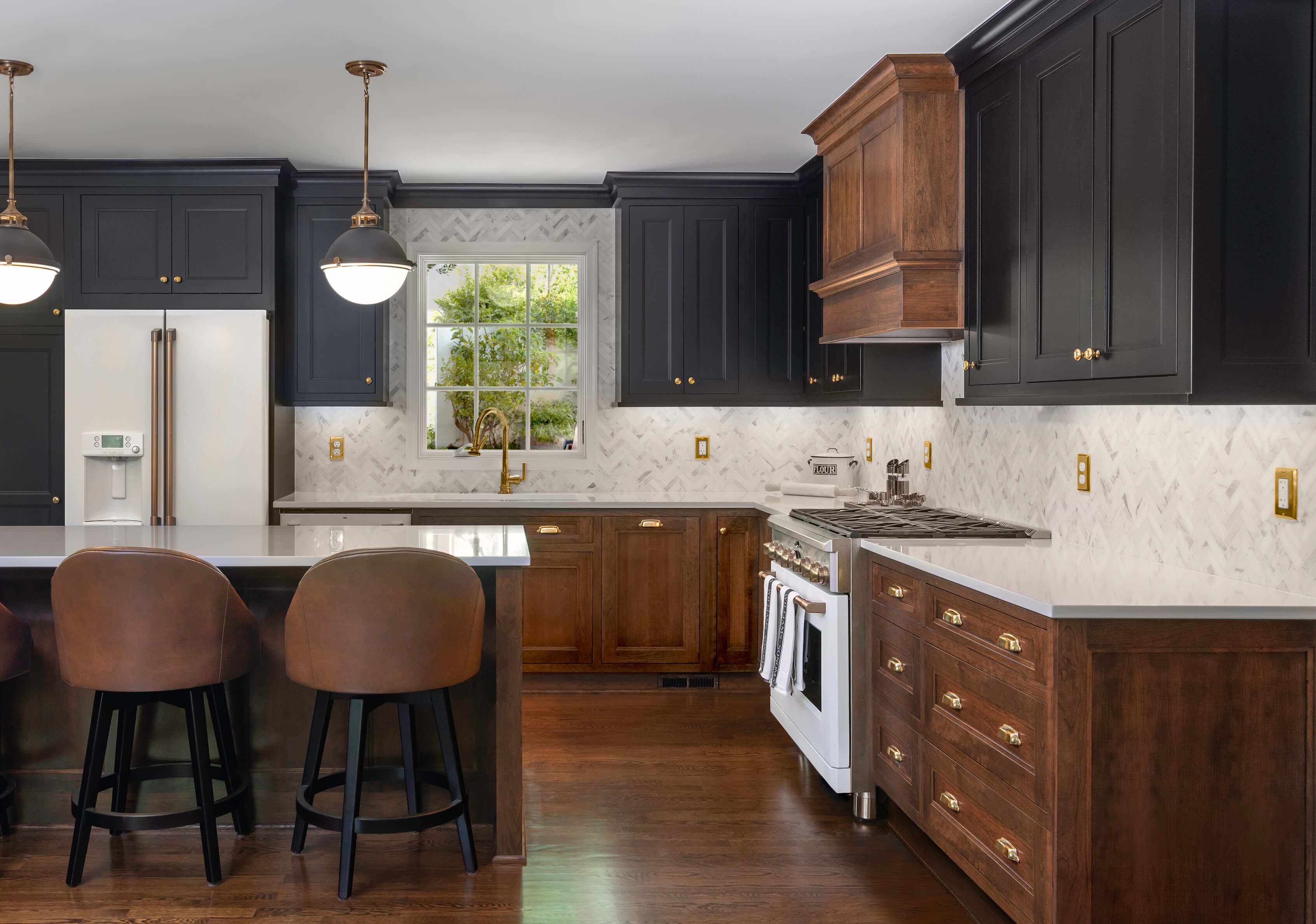 Black and Rich Cherry Wood Create a Romantic Kitchen Design in this newly remodeled kitchen in Virginia. Looking for something different than the white cabinets? Try black painted cabinets!