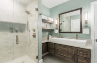 An L-shaped Floating Vanity that wraps the corner in a transitional style master bath.