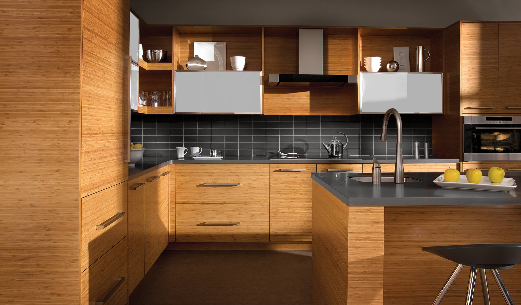 A modern kitchen with bamboo cabinets with a horizontal grain pattern.