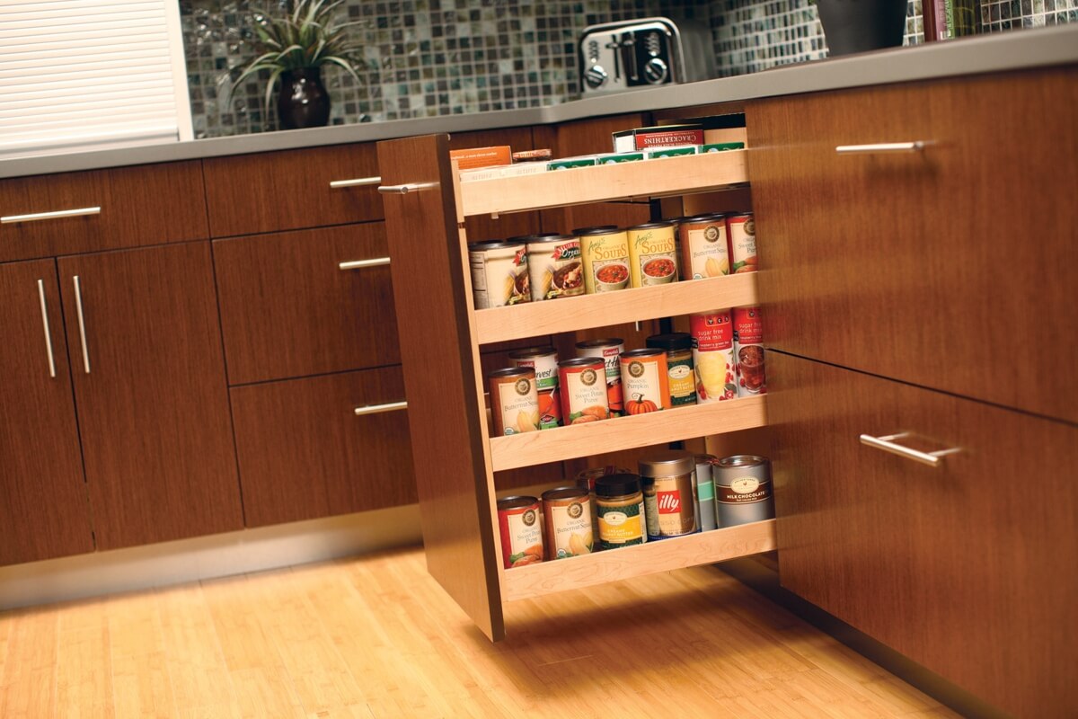 A Dura Supreme Base Pull-Out Pantry neatly stores row after row of pantry goods within a narrow space making it easy to see the entire contents of your pantry at a glance. (Available in wood or wire options)