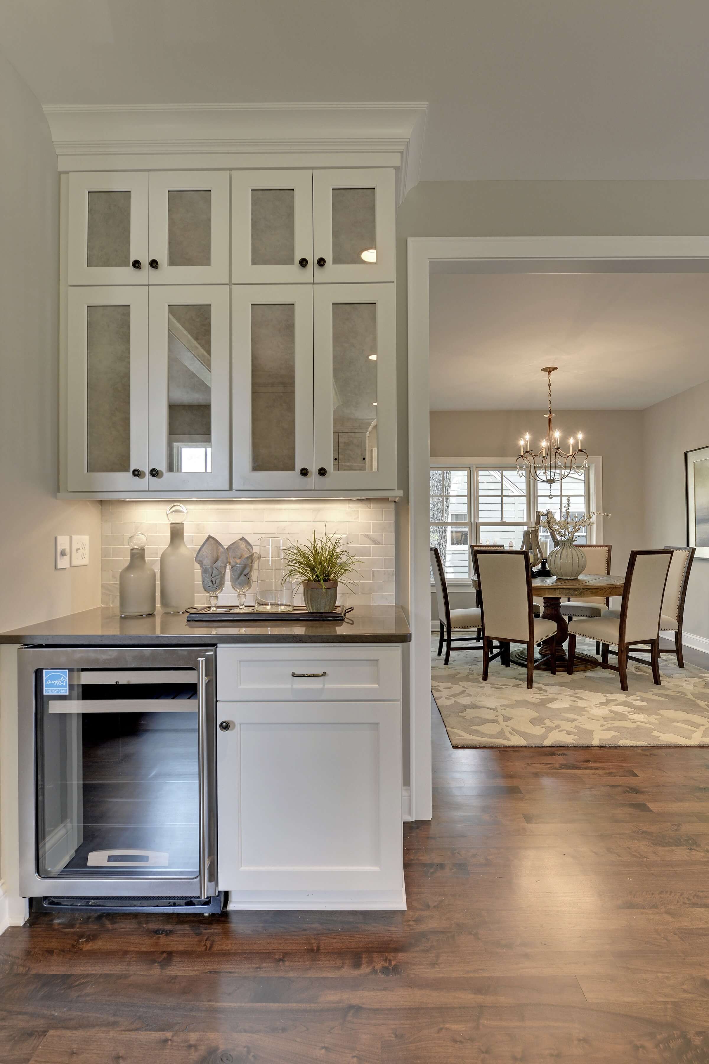 Glass cabinet door idea at a beverage area of the kitchen.