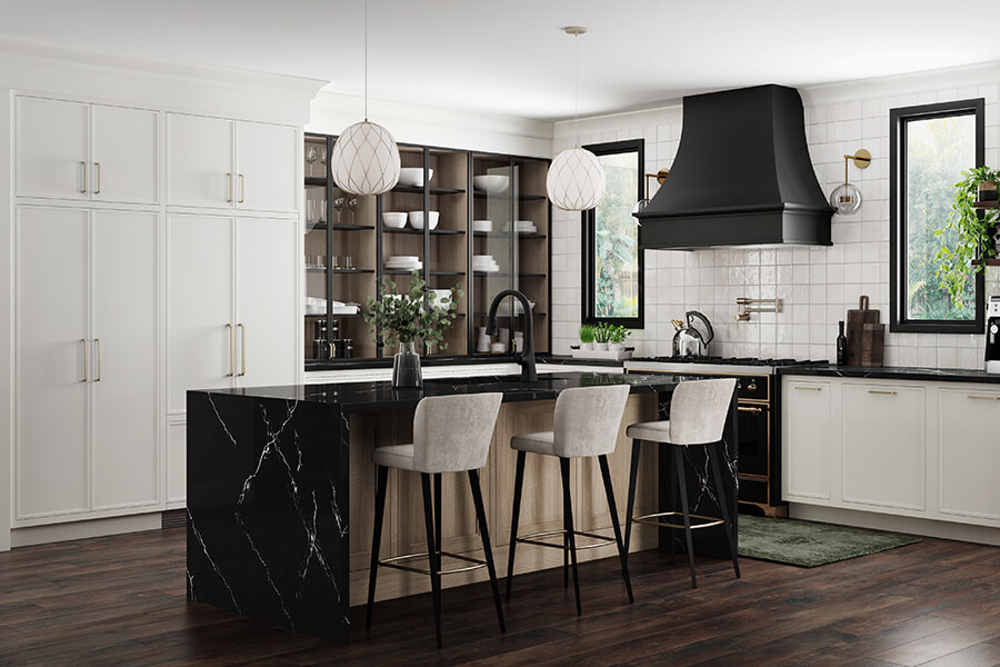 A white painted kitchen with skinny shaker doors, black accents, and a white oak kitchen island..