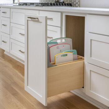 A pull-out cabinet for lots of tray storage. It's great for cutting boards, baking sheets, pans, and more.