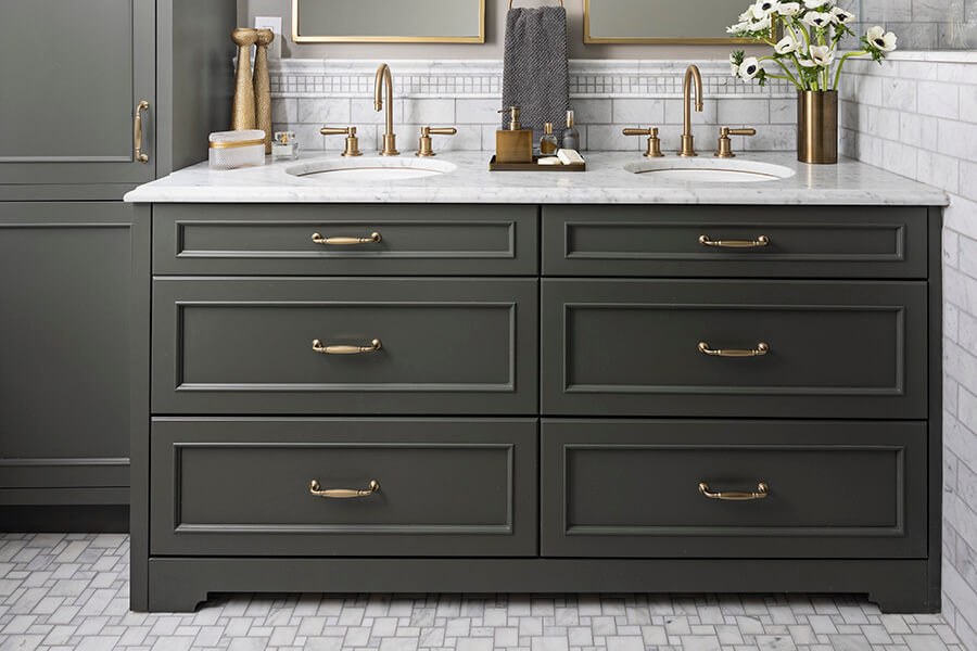 Dark green painted bathroom furniture vanity.