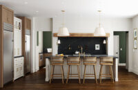 A new kitchen design remodeled with Dura Supreme cabinets featuring an alcove stove with a walk-in pantry behind it.