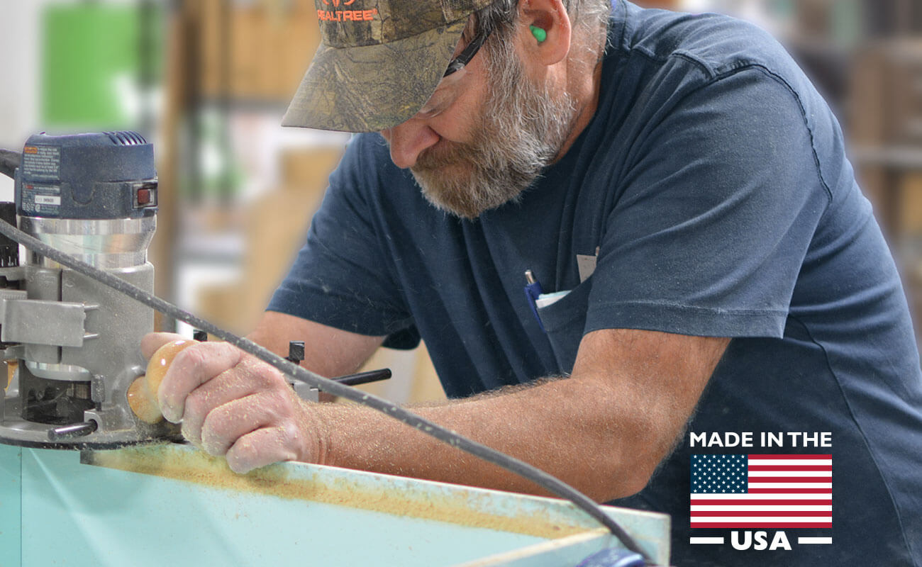 An American cabinet maker hard at work, crafting semi-custom and custom cabinetry made in the USA. Dura Supreme cabinetry offers the best in value, design, quality, and craftsmanship.